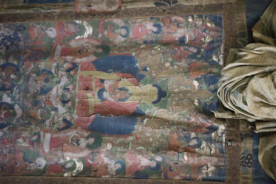 A thangka depicting Buddha Shakyamuni, Tibet, 18th/19th century, Total dimensions 123cm x 75cm, tears